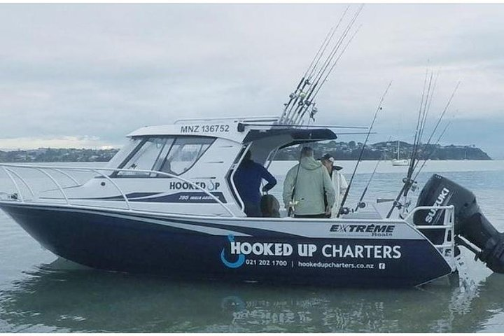 Experience the beauty of the Hauraki Gulf while casting your line with Captain Lozza whose expertise and friendly guidance promise an unforgettable fishing adventure amidst stunning landscapes.